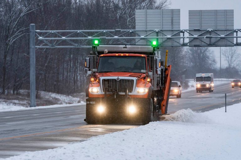 Green Warning Lights Enhance Plow Truck Visibility in Michigan Clear Roads